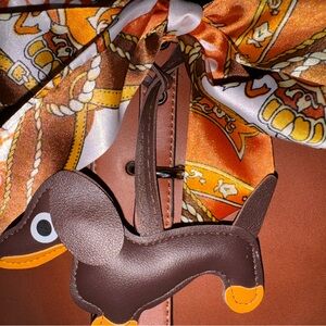 Chic Orange Scarf and Brown Dog Charm